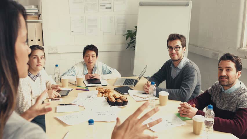 Employees learning new information in a meeting